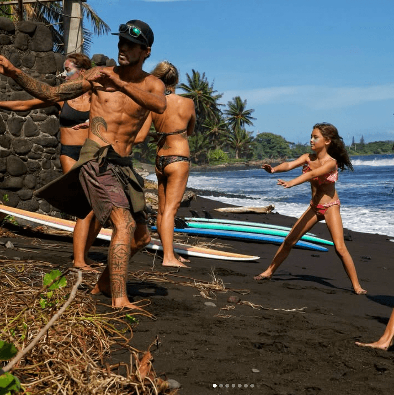 Surf instructor teaching in Tahiti